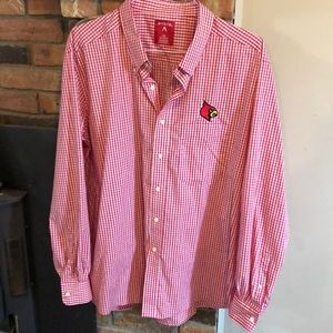 A MEN’s plaid button down shirt. Size 2XL
